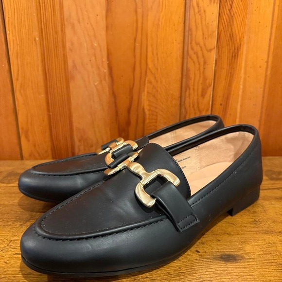 Shoes - black leather loafers with gold buckle